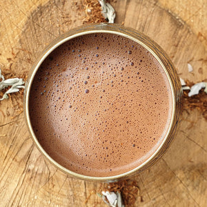 cacao filled goblet on wood